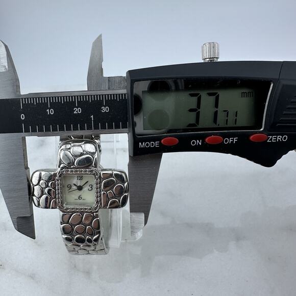 Women’s Silver Pebbled Cross Cuff Watch Mother of Pearl Dial - Has New Battery - Picture 8 of 14